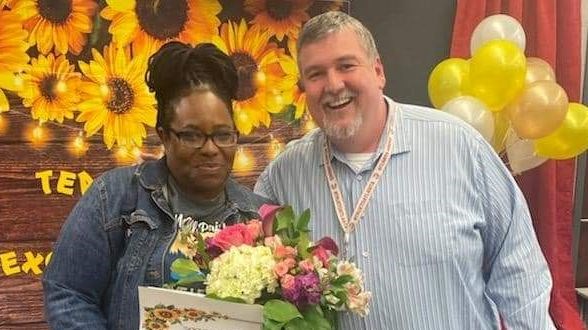 Kim Carr Classified Employee of the year and Thomas Farrell Principal